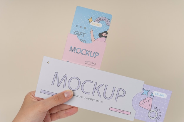 PSD hand holding gift card mockup