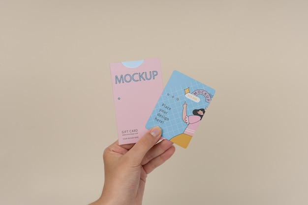 PSD hand holding gift card mockup