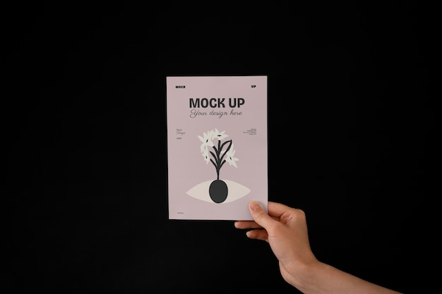 Hand holding greeting card mockup design
