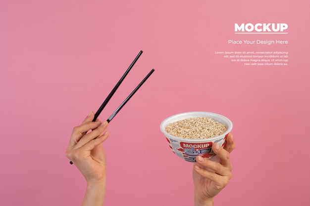 PSD hand holding noodle packaging