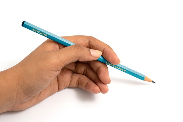 PSD hand holding pencil mockup