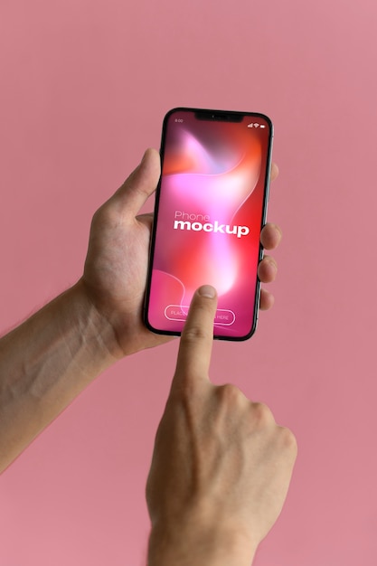 Hand holding phone screen mockup