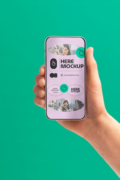 Hand holding smartphone mockup