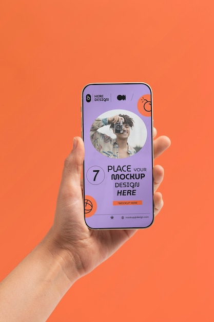 PSD hand holding smartphone mockup