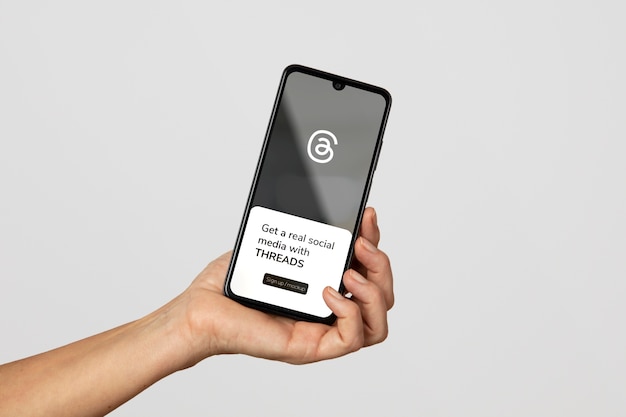 Hand holding smartphone  mockup