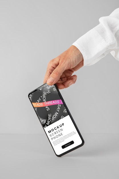 PSD hand holding smartphone  mockup