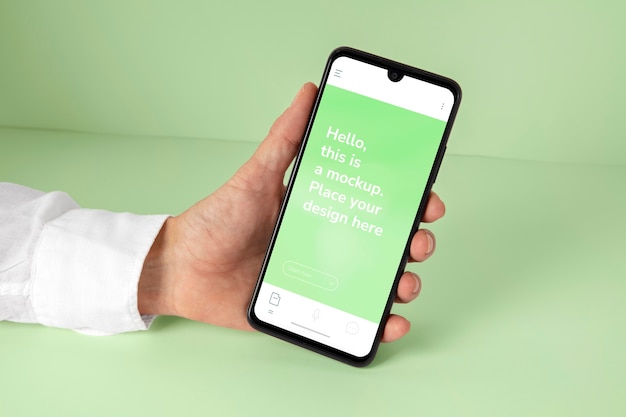 Hand holding smartphone  mockup