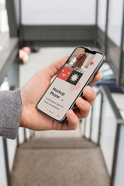 hand holding smartphone mockup