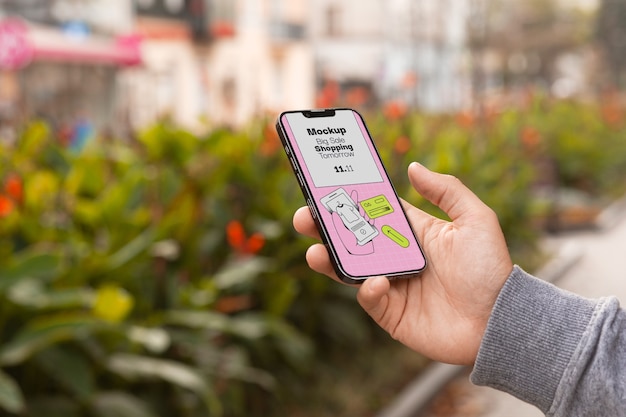 PSD mockup di smartphone in mano