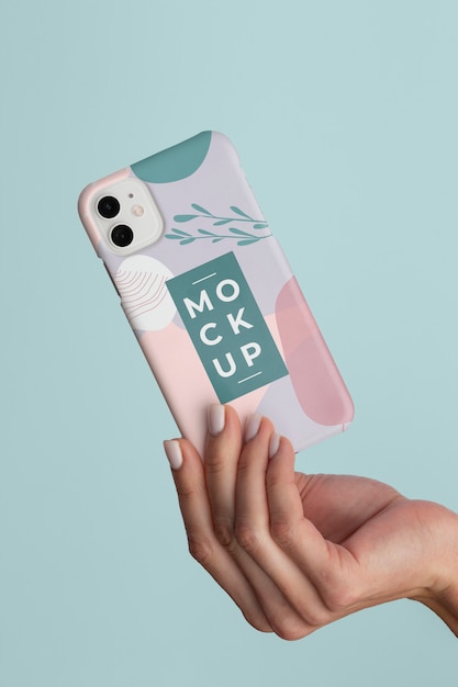 PSD hand holding smartphone with mock-up phone case