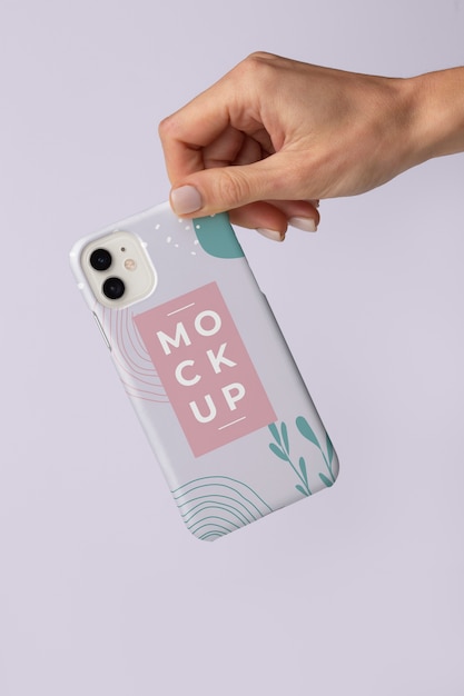 PSD hand holding smartphone with mock-up phone case