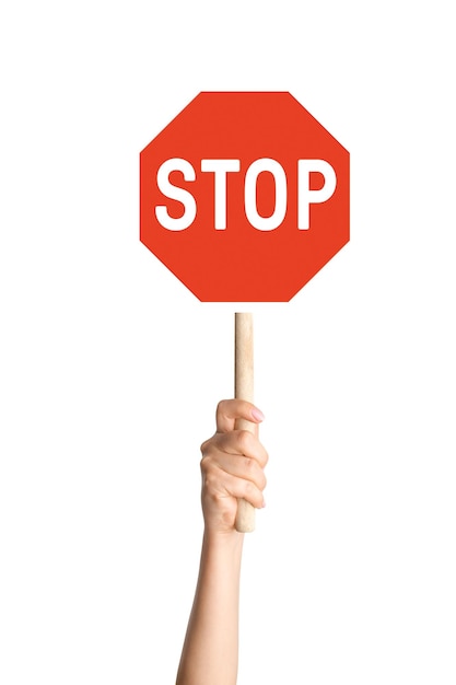 PSD hand holding stop sign on blank background