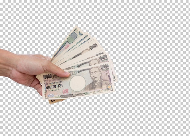 Hand holding ten thousand Yen banknote