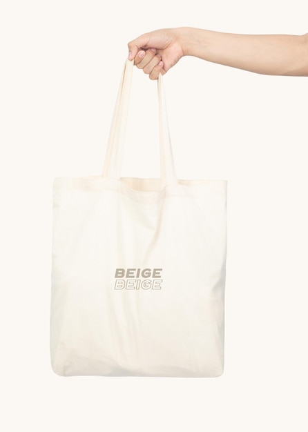 Hand holding Tote bag mockup psd, Template for your design.