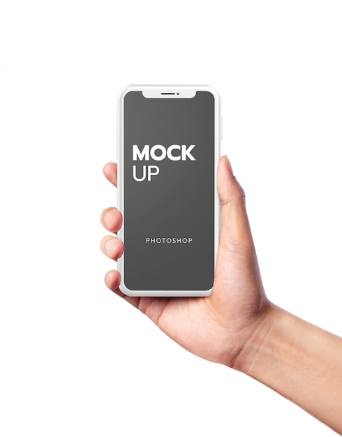 Hand holding white mobile phone mockup