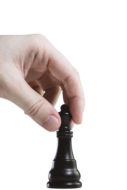 Hand met een zwart bischof schaakstuk