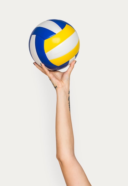 Hand met volleybal