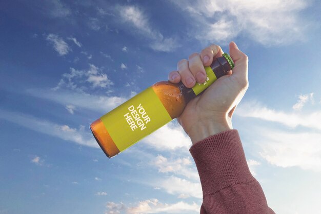 Hand sky beer mockup