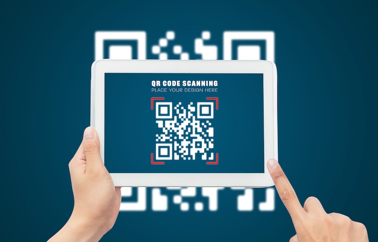 PSD hand using tablet computer scan qr code mockup