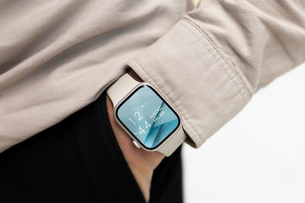 Hand wearing smartwatch mockup