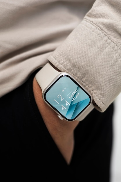Hand wearing smartwatch mockup