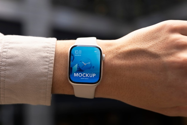Hand wearing smartwatch mockup