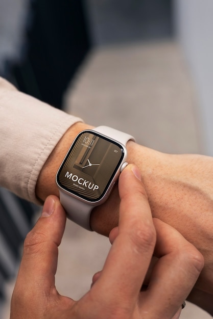 Hand wearing smartwatch mockup