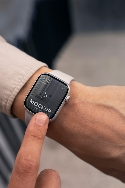 Hand wearing smartwatch mockup