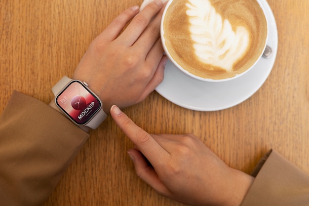 PSD hand wearing smartwatch mockup