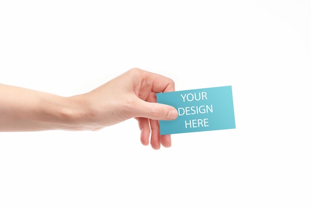 Hand with business card and with copy space