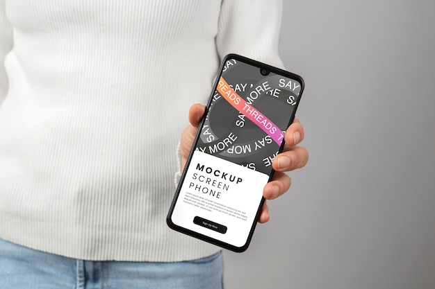 PSD handhoudende smartphone mockup