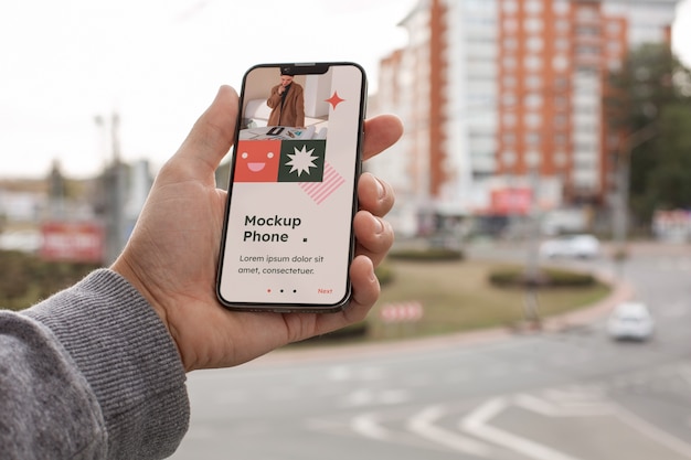 PSD handhoudende smartphone mockup