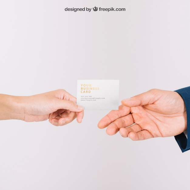 PSD hands exchanging business card