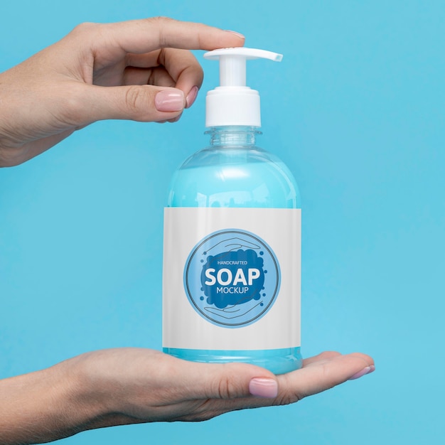 PSD hands holding bottle of liquid soap