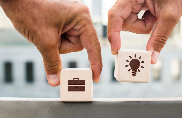 PSD hands holding dices with company ideas outdoors