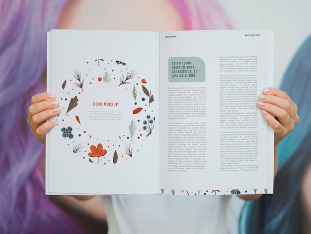 PSD hands showing pages of a mock up magazine
