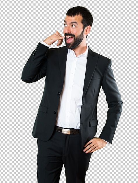 Handsome businessman making phone gesture