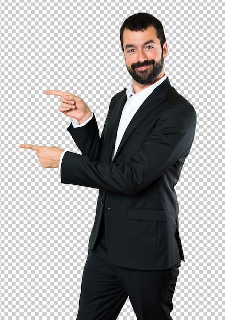 PSD handsome businessman pointing to the lateral