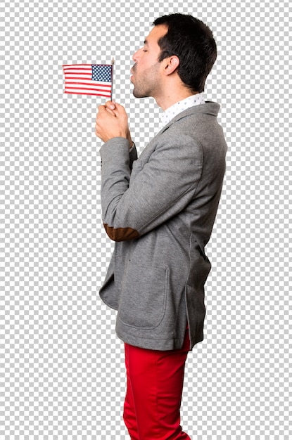 Handsome man holding an american flag