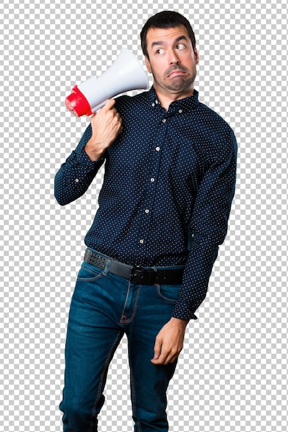 Handsome man holding a megaphone