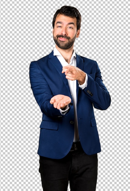 Handsome man holding something