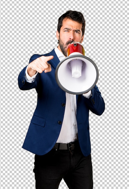 Handsome man shouting by megaphone