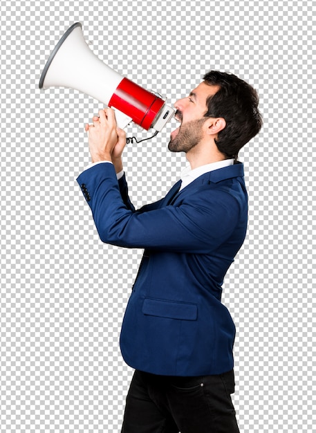 Handsome man shouting by megaphone