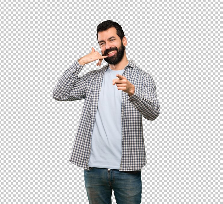 PSD handsome man with beard making phone gesture and pointing front