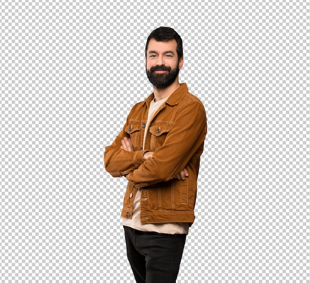 Handsome man with beard with arms crossed and looking forward