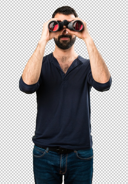 PSD handsome man with beard with binoculars