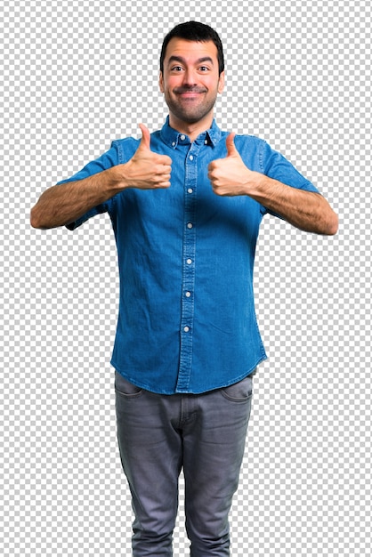 PSD handsome man with blue shirt giving a thumbs up gesture and smiling