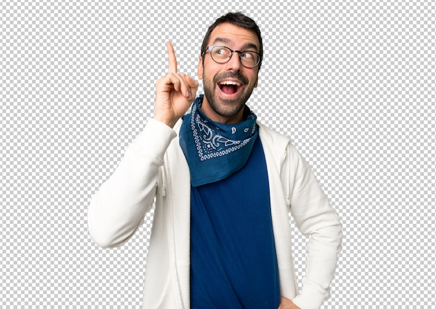 handsome man with glasses intending to realizes the solution while lifting a finger up