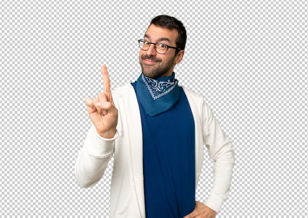 Handsome man with glasses showing and lifting a finger in sign of the best