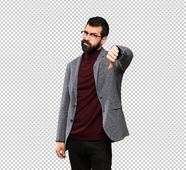 Handsome man with glasses showing thumb down with negative expression